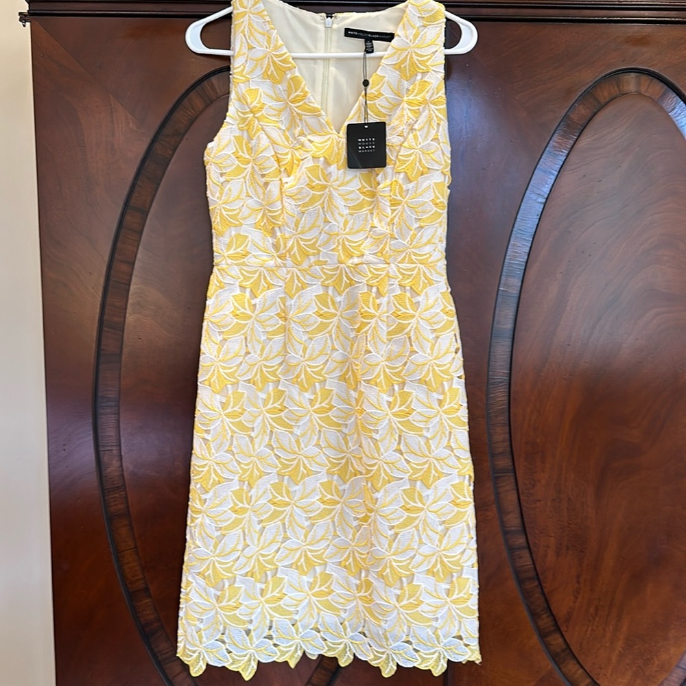 Floral overlay yellow dress.